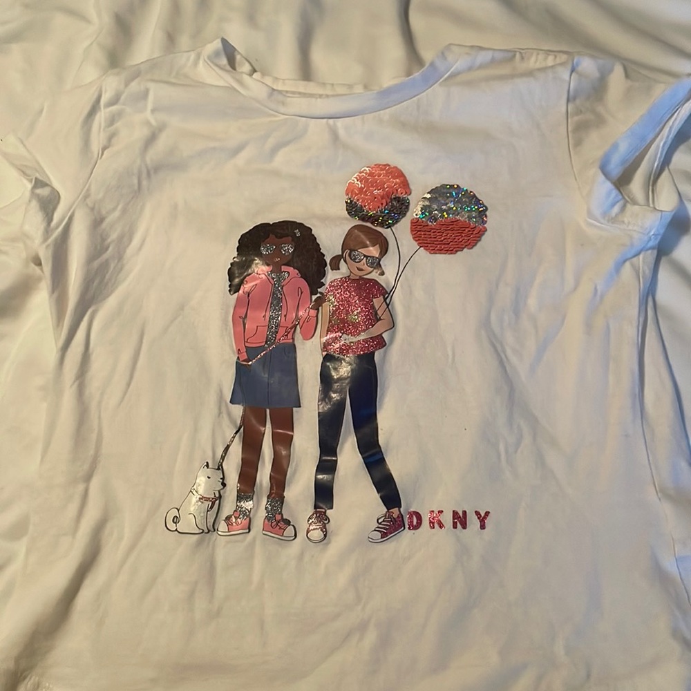 Good material, even has a cute dog on the shirt.